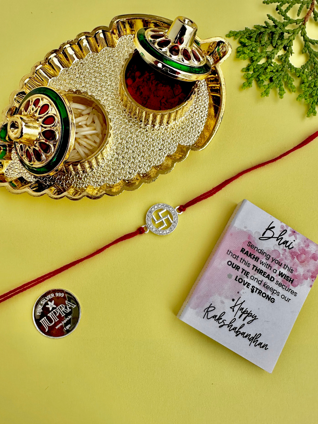 925 Sterling Silver Swastik Rakhi with silver coin, chocolate and roli chawal plate
