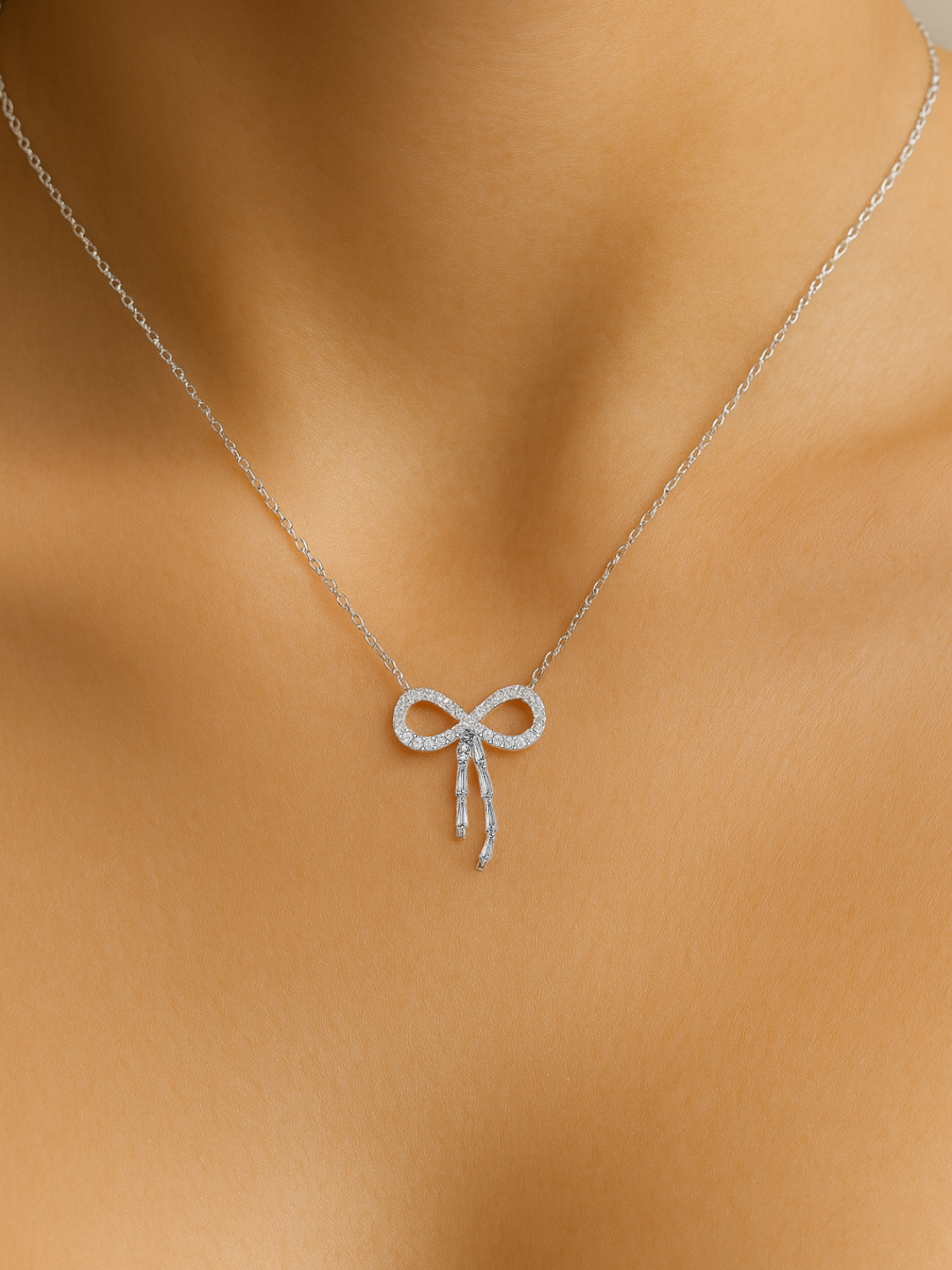 Infinity Bow 925 Sterling Silver Pendant Necklace with Dangling CZ Baguettes