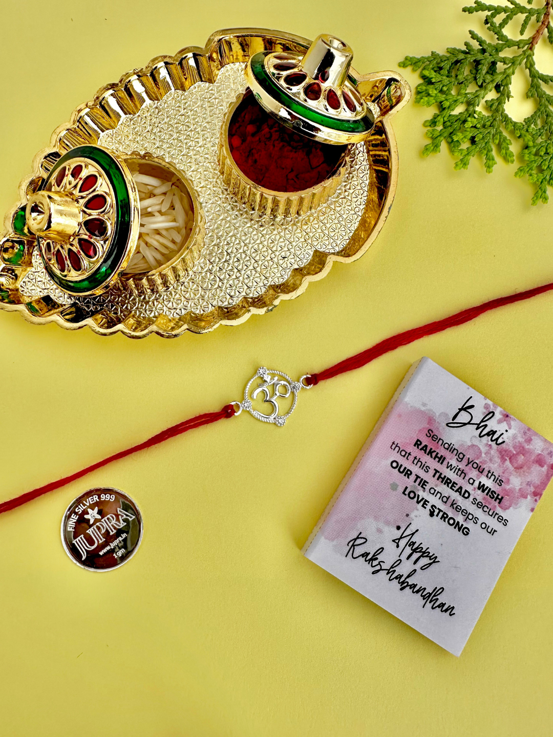 925 Sterling Silver Om Rakhi with silver coin, chocolate and roli chawal plate