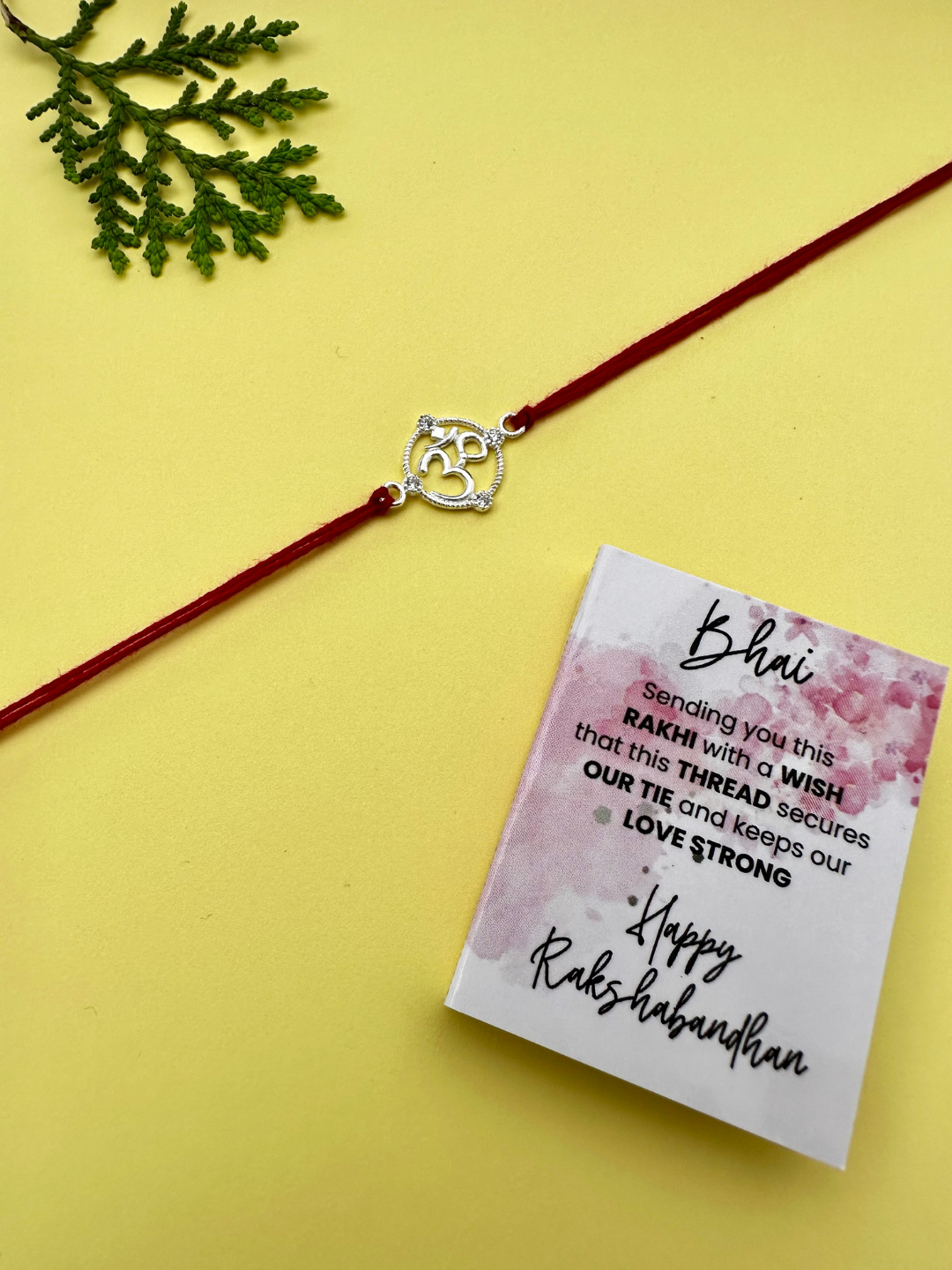 925 Sterling Silver Om Rakhi with silver coin, chocolate and roli chawal plate